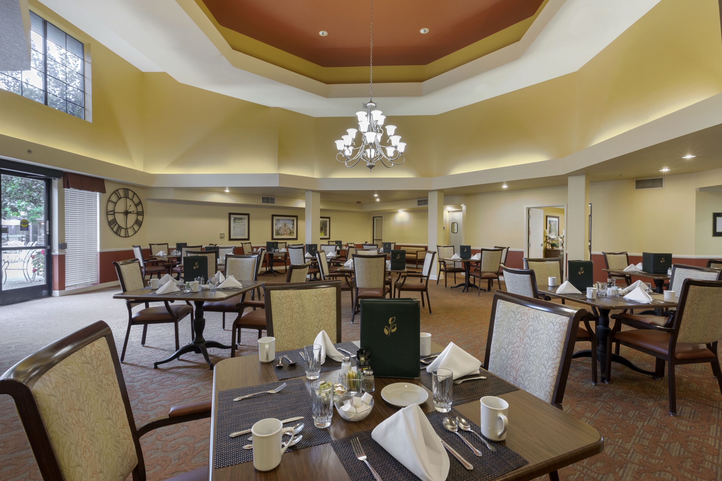 The dining room, laid for a meal
